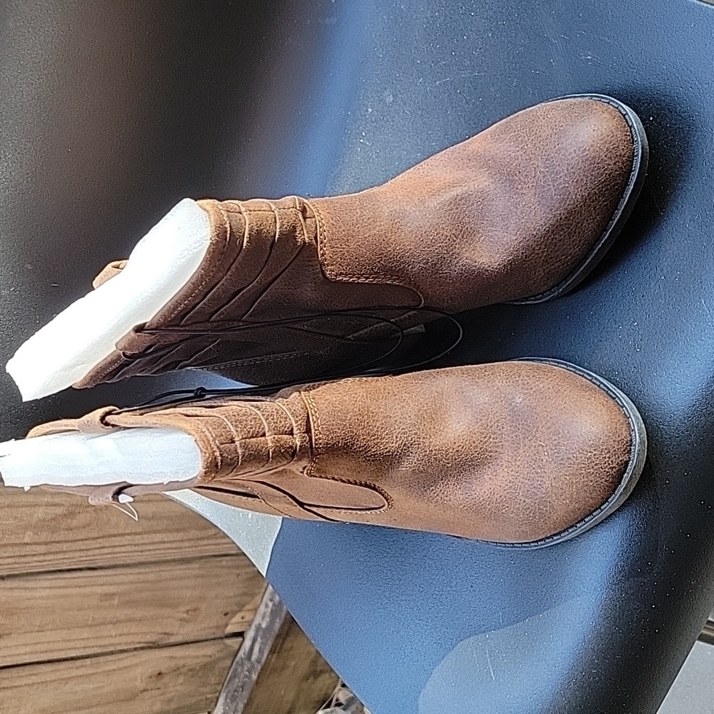 Brown ankle boots.  NWOT Approximately 2 inch rubber heel